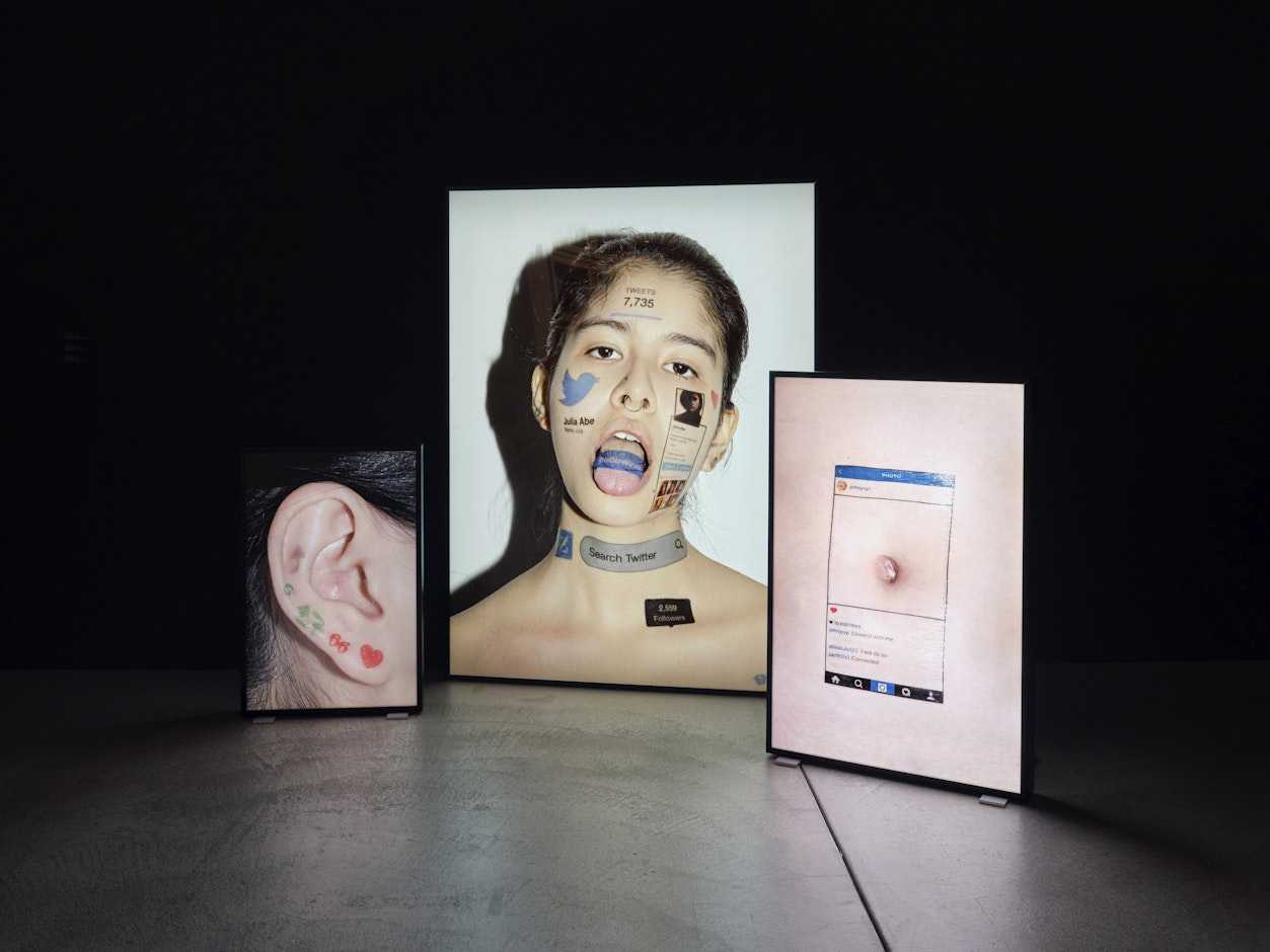 <div>Yuyi John, <em>Julia's Twitter 1, 2, </em>2016<em>, Belly Button</em>, 2018. Installation view <em>How to Win at Photography – Image-Making as Play, </em>Fotomuseum Winterthur © Fotomuseum Winterthur / Conradin Frei</div>